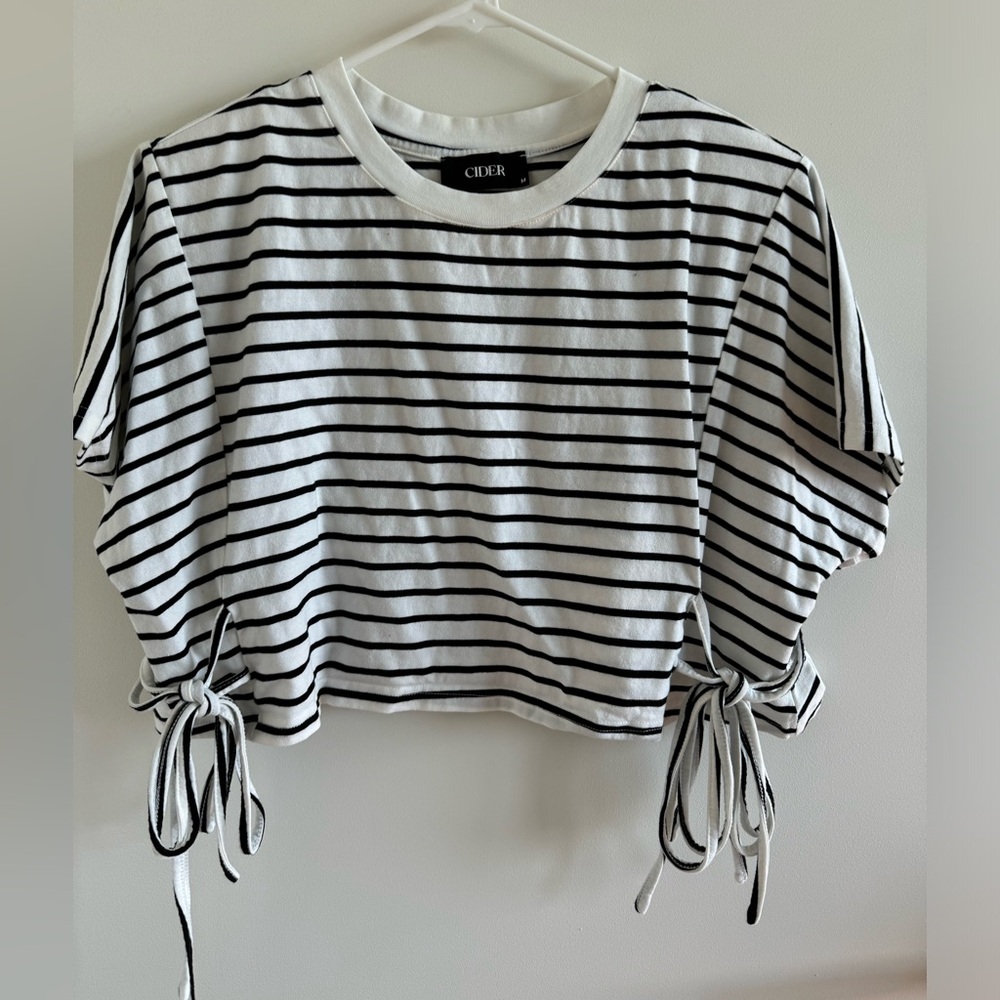 Cropped black and white striped tee with side tie detailing